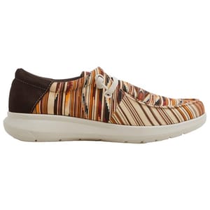 The Ariat Men's Hilo Chimayo Sneaker features a colorful striped pattern with a brown suede-like heel, white laces, and a thick white sole, offering a casual and stylish look.