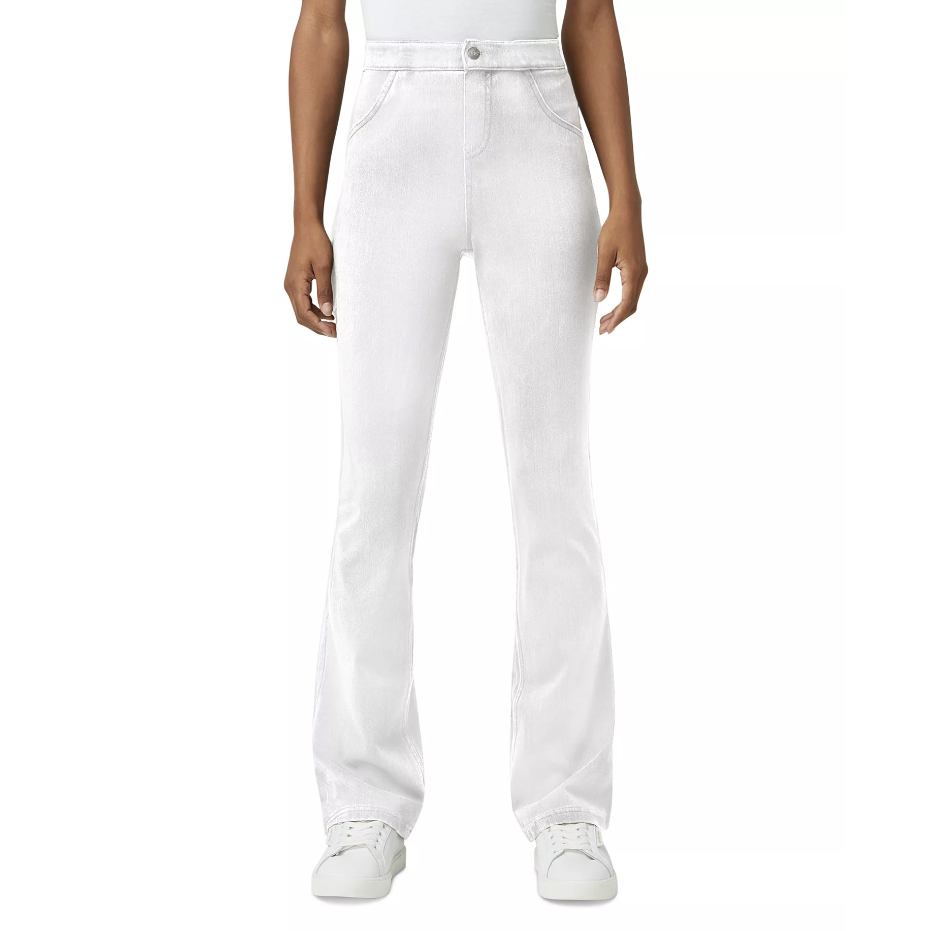 White high-waisted, flare-leg pants paired with white sneakers, worn by a standing person.