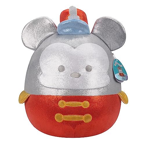 A plush Squishmallow designed to resemble Mickey Mouse as a band leader, featuring a red body, gray helmet with gold accents, and blue hat.