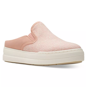 Pink slip-on shoes with a chunky white sole and a textured upper fabric.