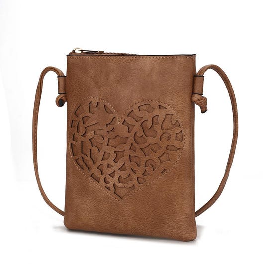Brown crossbody bag with a zip closure and an intricately cut-out heart design on the front. Features a thin, adjustable strap.