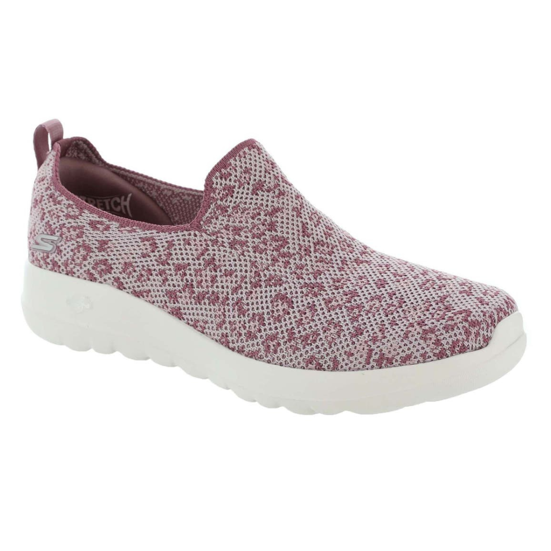 The Skechers Go Walk Joy-Mariah shoes are slip-on walking sneakers featuring a maroon and white speckled knit upper with a stretchy fit, supported by a lightweight, cushioned white sole for comfort.
