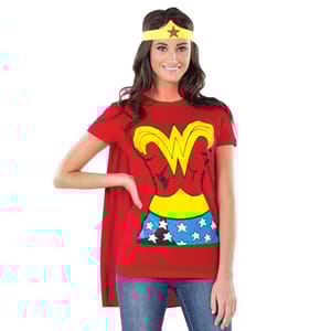 A red short-sleeve shirt features a printed Wonder Woman costume design with a yellow \“W\“ emblem and a blue section with white stars, accompanied by a gold headband with a red star.