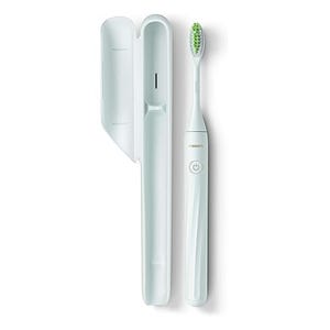 The Philips One by Sonicare Toothbrush is a sleek, white electric toothbrush with a travel case. It features a simple power button and green bristles designed for effective cleaning.