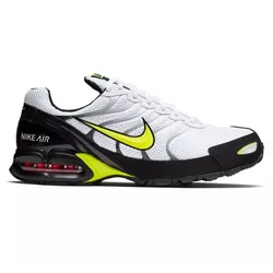 Nike Air Max Triax 96 sneaker in white, black, and neon yellow featuring a visible air cushion in the heel and mesh upper with synthetic overlays.