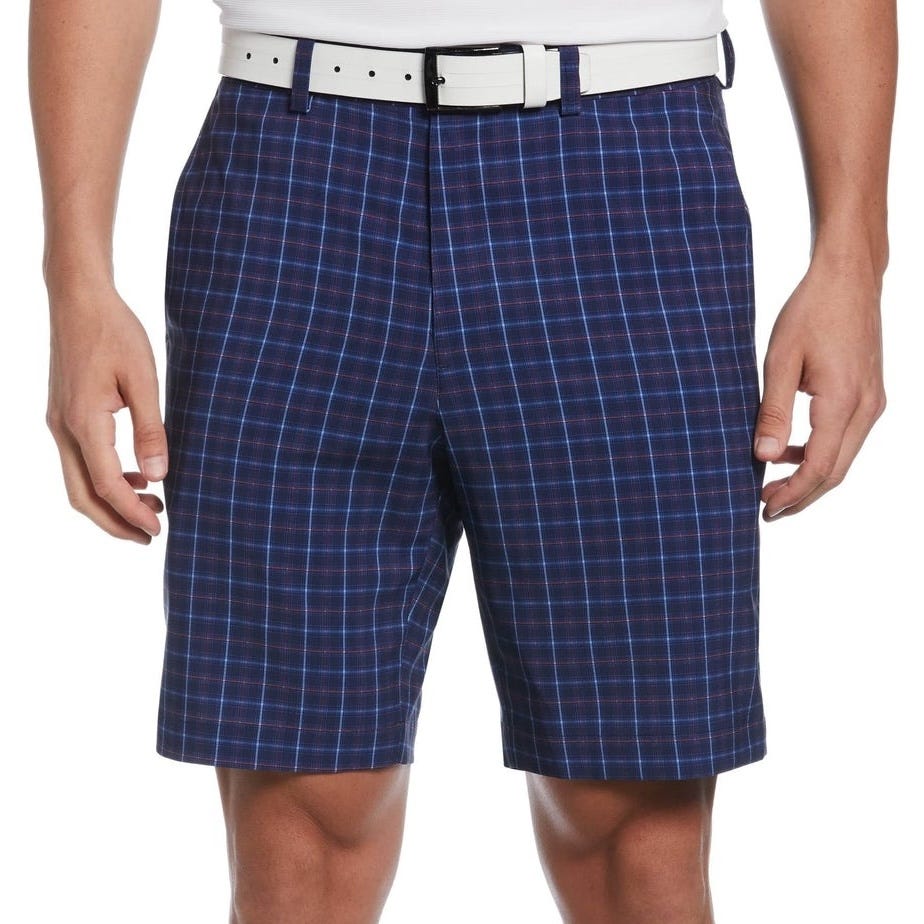 Navy plaid shorts worn with a white belt, featuring a tailored fit and classic check pattern, paired with a white shirt in the upper frame.