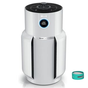 Refurb Shark Air Purifier includes a digital display and NeverChange filter technology, indicating 100% particle processing. It features a sleek white design with a compact, cylindrical shape and is accompanied by a small filter or component.