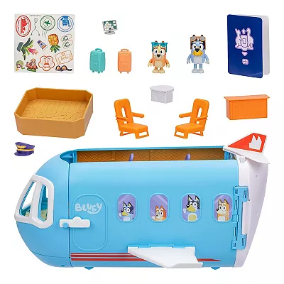 This is a toy set featuring a blue airplane with opening compartments, small character figures, seats, luggage, and various accessories designed for play.