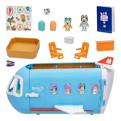 This is a toy set featuring a blue airplane with opening compartments, small character figures, seats, luggage, and various accessories designed for play.