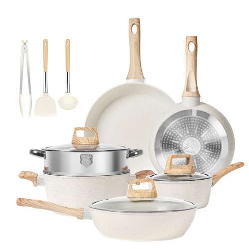 Cookware set with a frying pan, saucepan, lidded pot, pasta pot with steamer insert, plus a ladle, spatula, and tongs; features wood-look handles and light-colored non-stick surfaces.