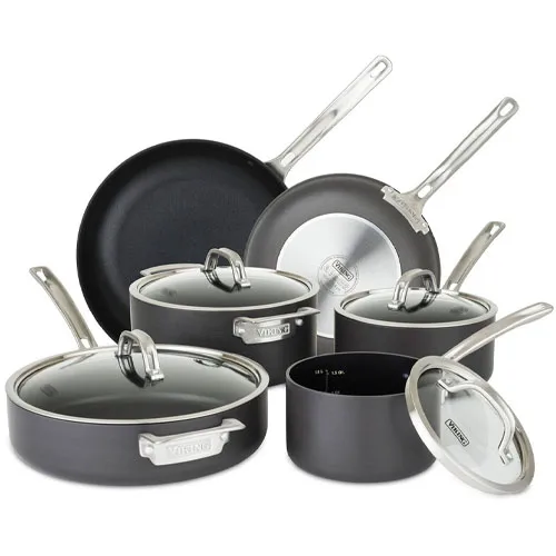 Cookware set including two frying pans and four lidded pots, all in non-stick, dark material with stainless steel handles.