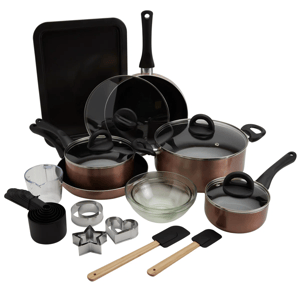 A cookware and bakeware set including saucepans with lids, a frying pan, a baking sheet, a glass mixing bowl, measuring cups, cookie cutters, and spatulas.