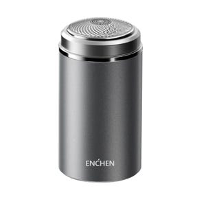 A cylindrical, dark gray electric travel shaver with a metallic finish and a circular shaving head on top, branded with \“ENCHEN.\“
