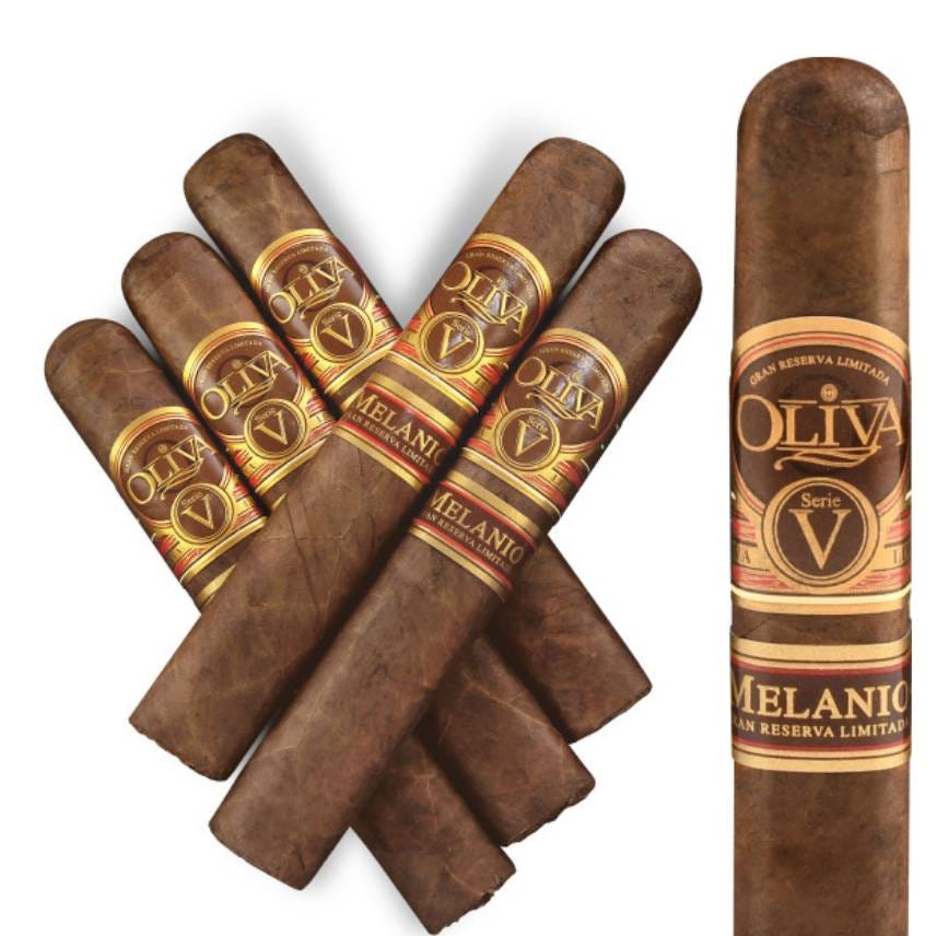 A collection of Oliva Serie V Melanio cigars arranged in a star pattern.
