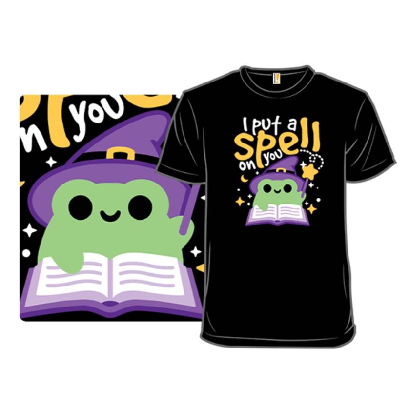 A black t-shirt and a matching square print featuring a green cartoon frog wearing a witch's hat with the phrase \“I put a spell on you.\“
