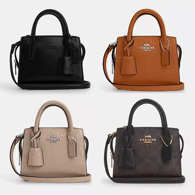Four different colored leather handbags, each with dual top handles and brand logo on the front.