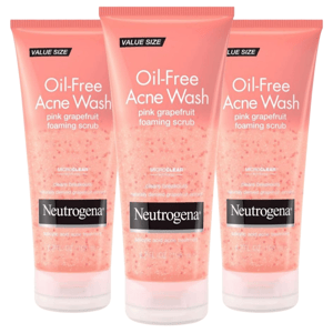 Neutrogena Oil-Free Acne Wash Pink Grapefruit Foaming Scrub is shown, featuring a pink design with salicylic acid acne treatment and MicroClear technology to clear breakouts. Each is labeled \“Value Size.\“