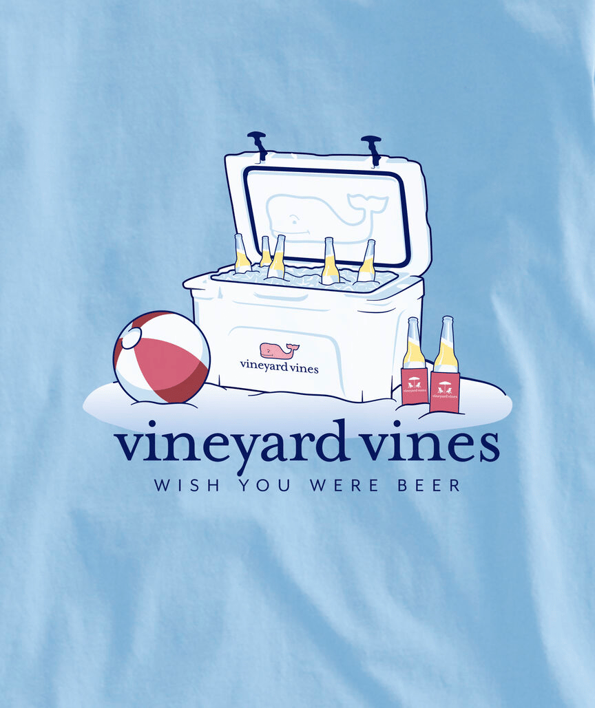A cooler full of beer bottles next to a beach ball, with the Vineyard Vines logo and the phrase \“Wish You Were Beer\“ on a light blue background.
