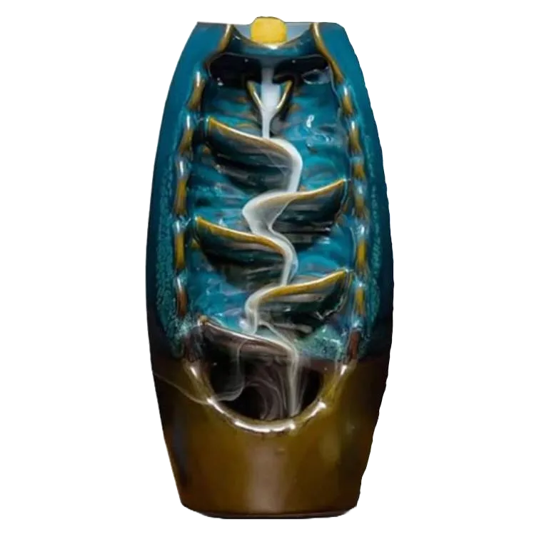 Backflow incense burner with a spiral waterfall design and gold-brown detailing.