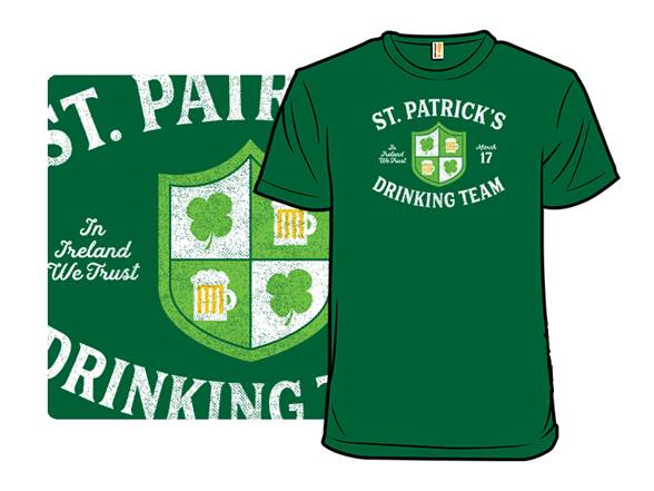 Green T-shirt featuring a design with the text \“St. Patrick's Drinking Team,\“ a shield with shamrocks and beer mugs, and the phrase \“In Ireland We Trust.\“