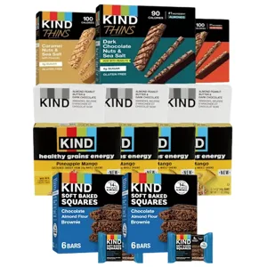 Assortment of KIND snacks, including Thins (Caramel Nuts & Sea Salt, Dark Chocolate Nuts & Sea Salt), energy bars (Pineapple Mango, Mango), and Soft Baked Squares (Chocolate Almond Flour Brownie).