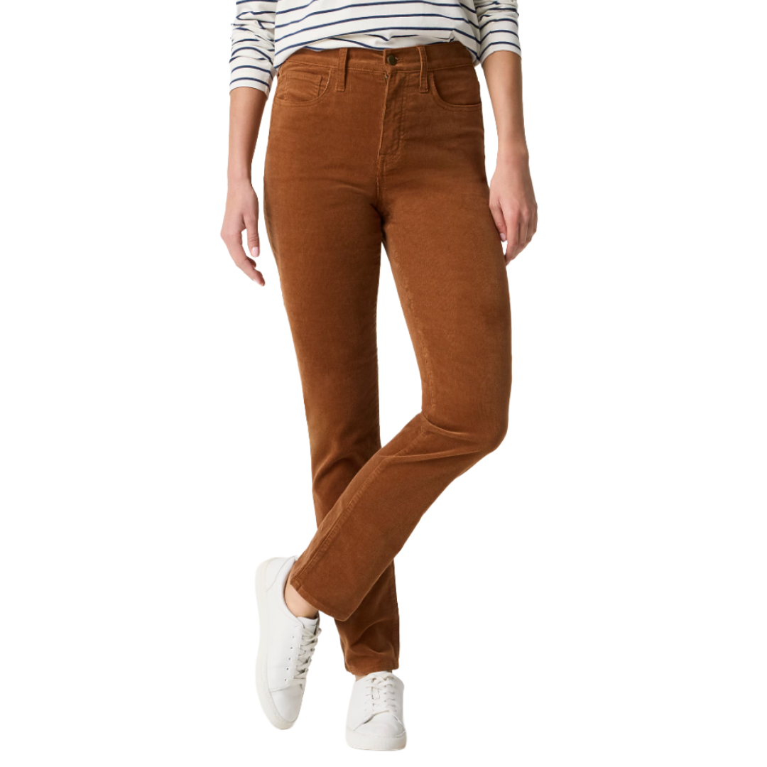 A person wearing brown corduroy pants with a straight-leg fit, paired with a white and navy striped top and white sneakers.