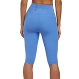 High-waisted blue capri leggings with a back pocket and seam detailing.