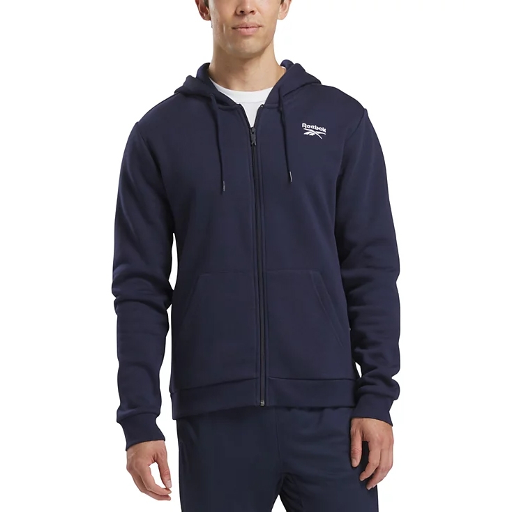 A navy blue Reebok zip-up hoodie with a drawstring hood and front pockets, featuring the Reebok logo on the chest.