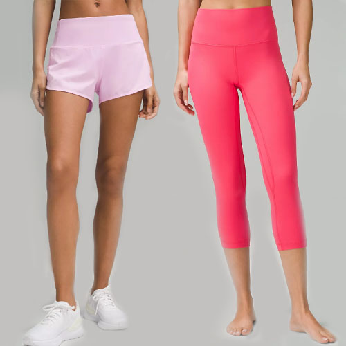 Two models wearing athletic wear; one in pink shorts and the other in red cropped leggings.
