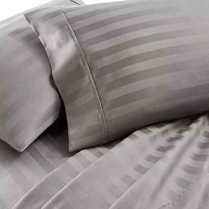 Gray Cali King 1,000TC cotton sheet set featuring subtle vertical stripes; includes pillowcases and a fitted sheet for a luxurious look and feel.