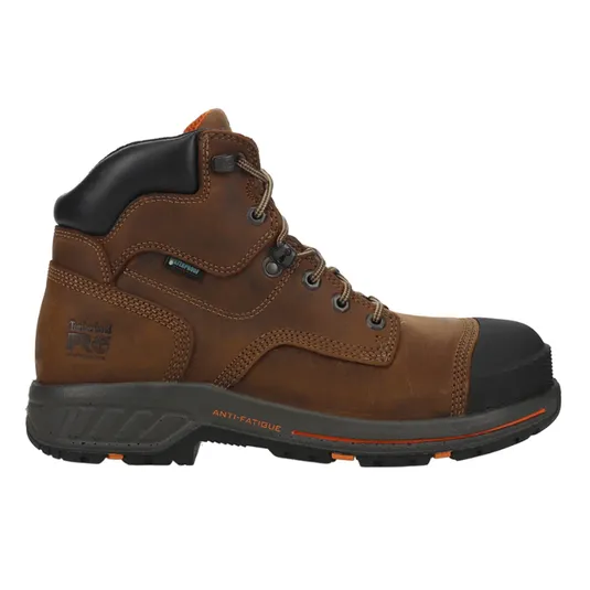 A brown leather work boot with anti-fatigue technology, featuring metal eyelets and a reinforced toe.
