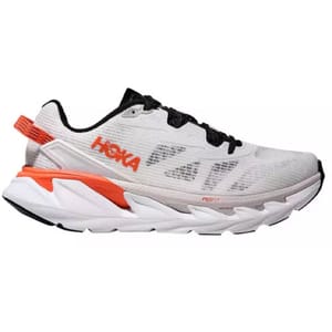 A white running shoe with black and orange accents, featuring the HOKA brand logo and PROFLY+ technology on the sole for enhanced performance.