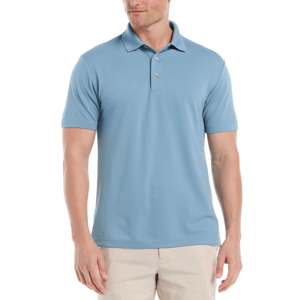 A man is wearing a light blue short-sleeve polo shirt with beige pants. The polo has a classic collar and two buttons.