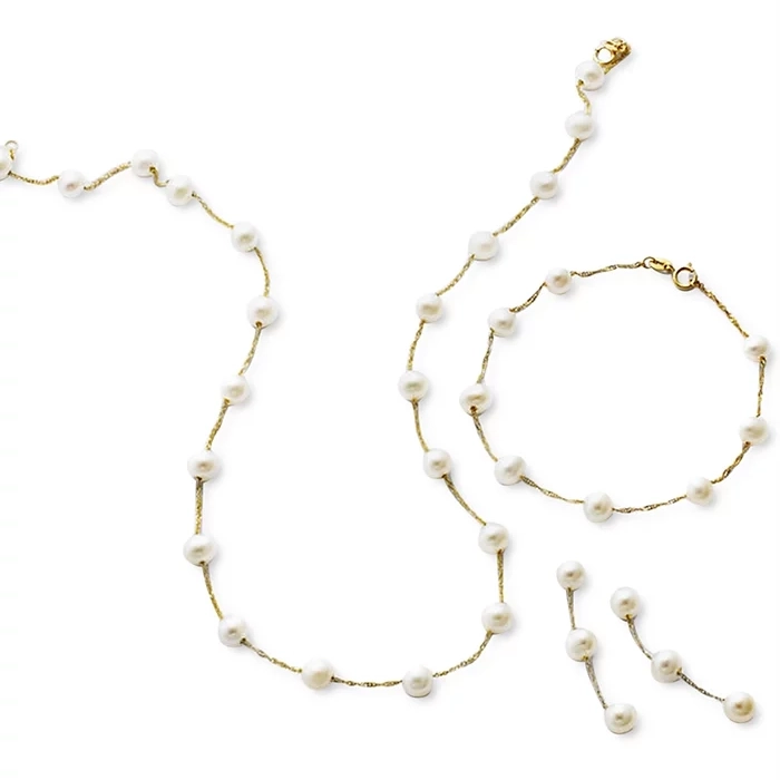 Pearl necklace and bracelet set with gold chain links on a white background.