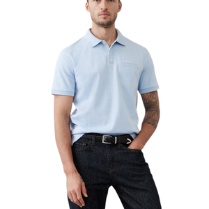 A light blue short-sleeve polo shirt from Banana Republic Factory with a classic collar and a small chest pocket, paired with dark jeans and a black belt.