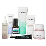 Dr. Brandt skincare collection featuring Clean Biotic cleansing gel, Microdermabrasion exfoliator, Revitalizing Face Serum, Luminizer Primer, Wrinkle Smoothing Cream, No More Baggage de-puffing gel, 24/7 Eye Cream, and Firming Day Cream.