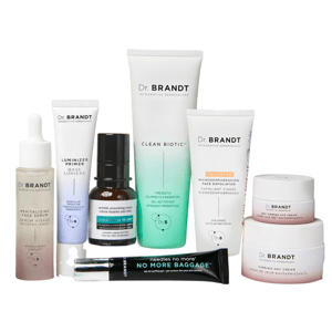 Dr. Brandt skincare collection featuring Clean Biotic cleansing gel, Microdermabrasion exfoliator, Revitalizing Face Serum, Luminizer Primer, Wrinkle Smoothing Cream, No More Baggage de-puffing gel, 24/7 Eye Cream, and Firming Day Cream.