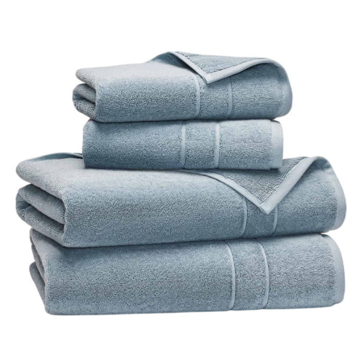 A stack of folded light blue towels in varying sizes, displayed against a white background.