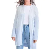 A woman is wearing a light blue open-front cardigan with ribbed cuffs, paired with a white top and blue jeans.