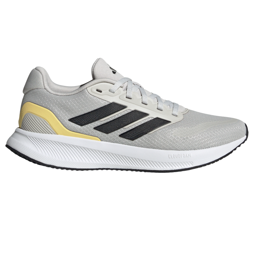 A gray and white Adidas running shoe featuring black stripes and yellow accents with Cloudfoam cushioning.