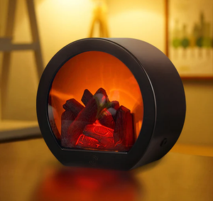 A circular electric fireplace with glowing faux logs is placed on a wooden table, offering a cozy, warm ambiance to the room.