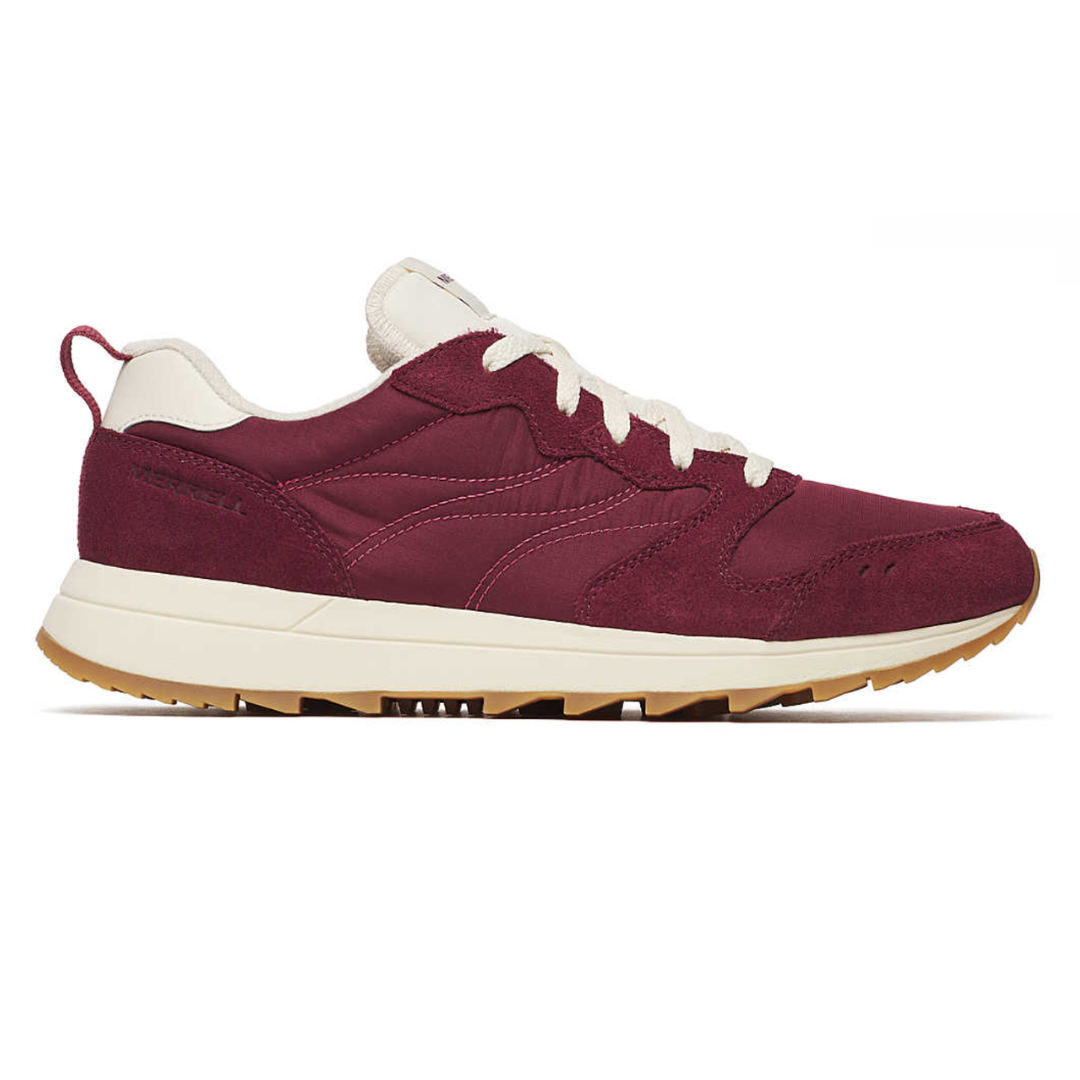 Merrell Men's Alpine Sneakers feature a maroon suede and textile upper, cream laces, and a gum rubber outsole. The design includes a padded collar and heel tab for added comfort and support.