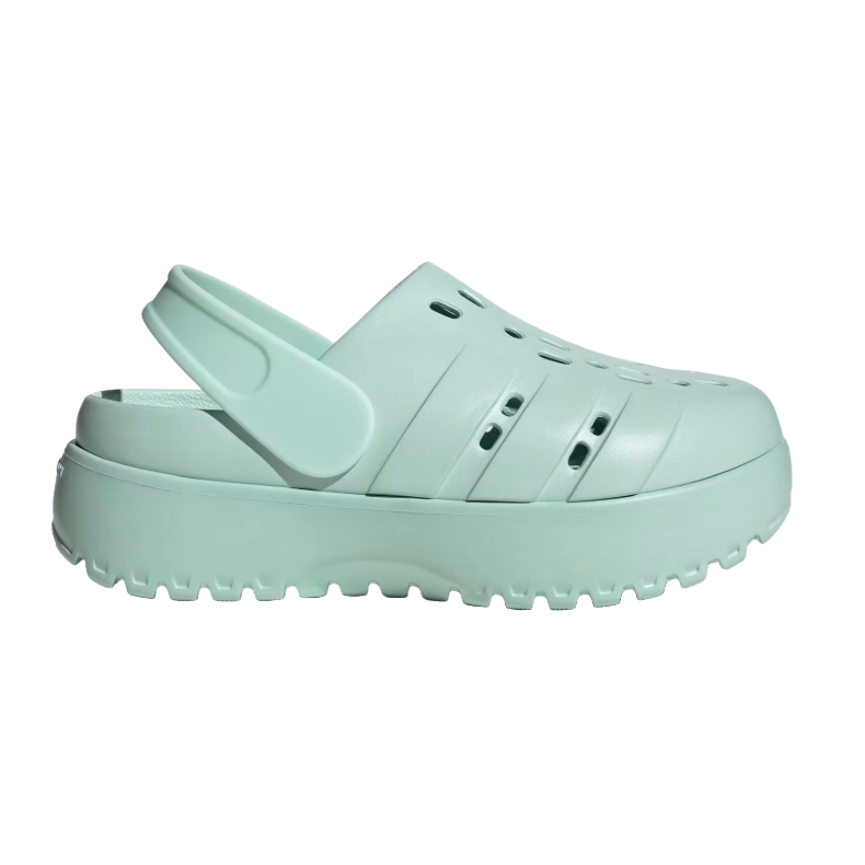 Light mint green Adidas Adilette Platform Clogs with a chunky sole, vent holes for breathability, and a movable strap for a secure fit.