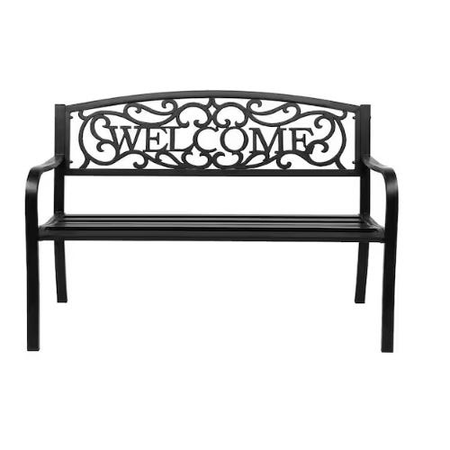 Black metal bench with decorative backrest featuring the word \“WELCOME\“ in an ornamental design.