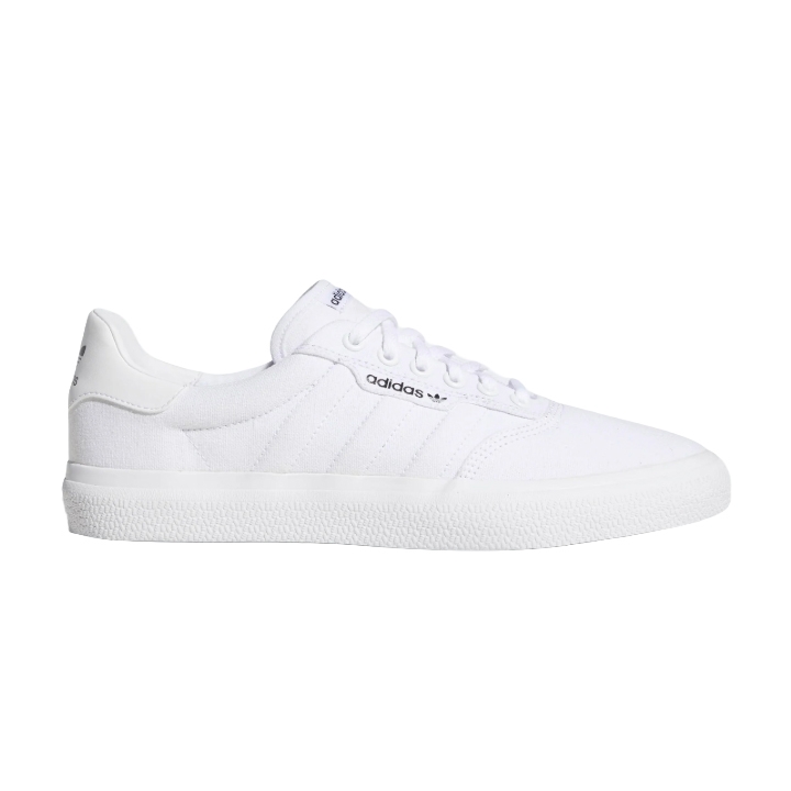 Adidas Men's Vulc Shoes feature a sleek, all-white design with a classic low-top silhouette, lace-up closure, and textured rubber sole. The shoes showcase subtle Adidas branding on the side and heel for a clean and minimalist look.