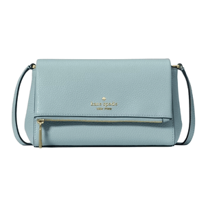 Light blue Kate Spade New York crossbody bag with gold-tone logo and a front zipper pocket.
