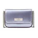 A metallic silver Kate Spade New York crossbody bag with a chain strap and logo plaque on the front.