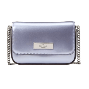 A metallic silver Kate Spade New York crossbody bag with a chain strap and logo plaque on the front.