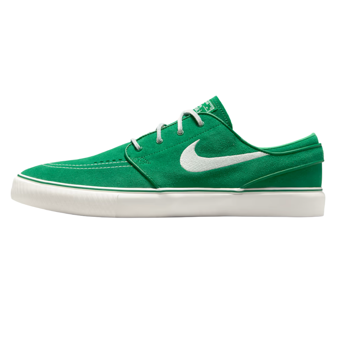 Green Nike skate shoe with white laces and Swoosh logo, featuring a white rubber sole.