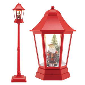 A red Christmas lamppost decoration features a Santa and Christmas tree scene inside, with a snow globe effect.